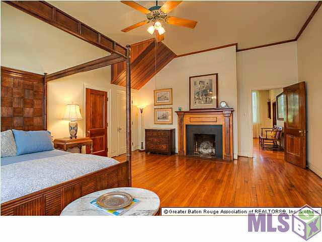4150 Perkins Road Baton Rouge, LA 70808 - Photo 13 of 31 Master Bedroom w/ fireplace bordered in black marble