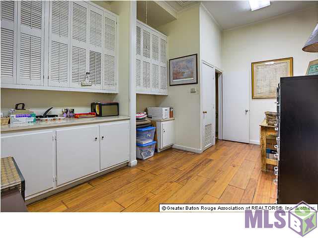 4150 Perkins Road Baton Rouge, LA 70808 - Photo 18 of 31 Office 2 in the A. Hayes Town Addition has half bath lots of storage and access to huge floored atti