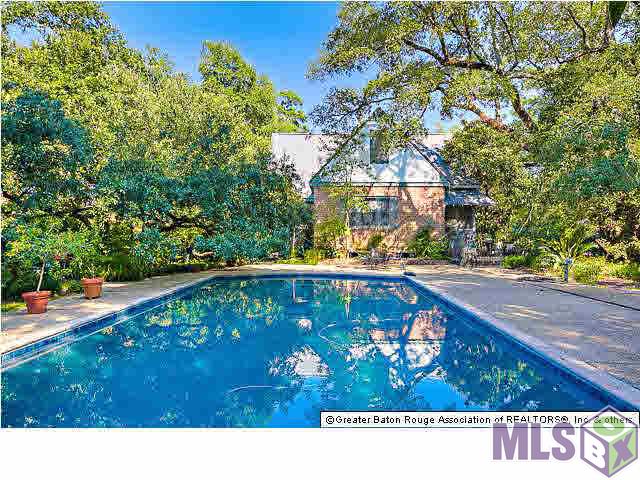 4150 Perkins Road Baton Rouge, LA 70808 - Photo 5 of 31 View of the west side of the house across the pool