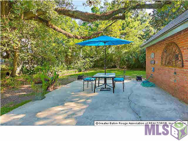 4150 Perkins Road Baton Rouge, LA 70808 - Photo 6 of 31 Patio next to the pool house and pool and rear/side yard