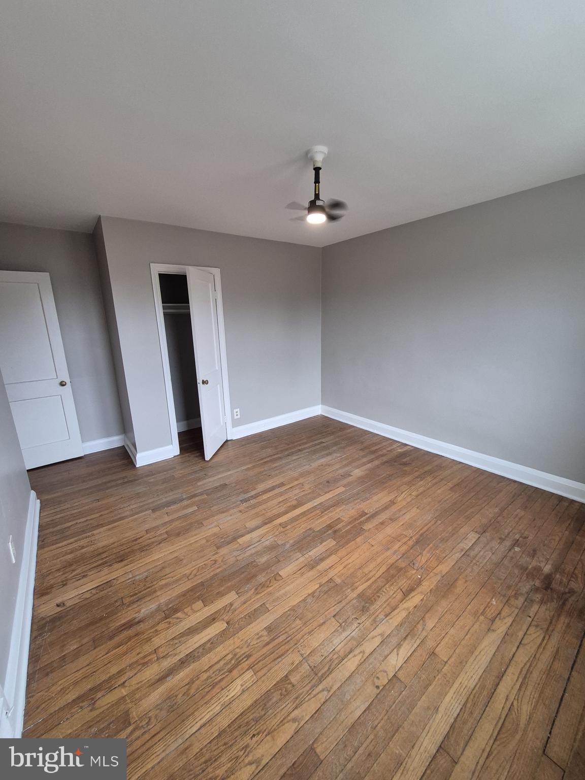 4905 Briarclift Road Baltimore, MD 21229 - Photo 18 of 41 a view of empty room with wooden floor