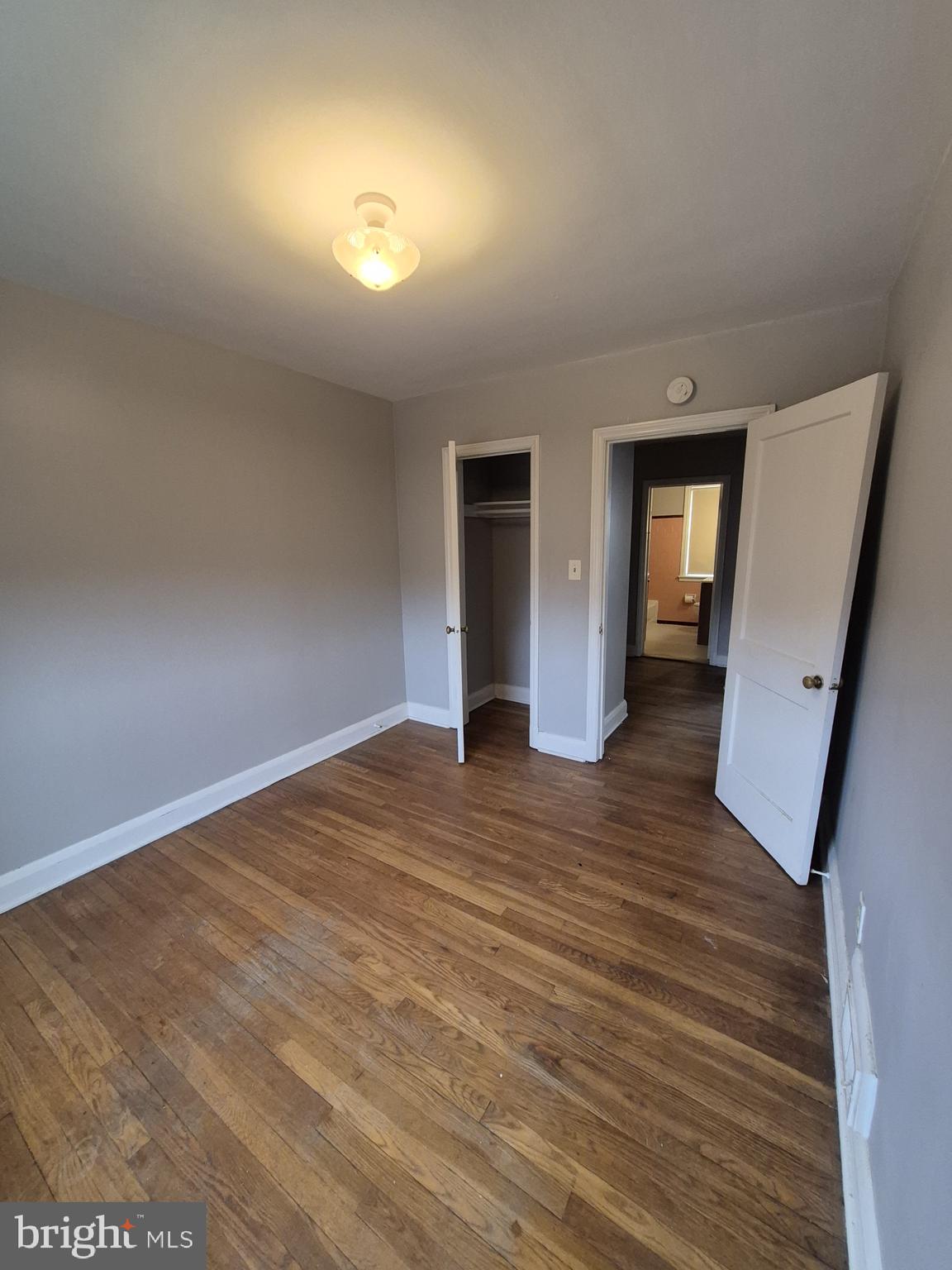 4905 Briarclift Road Baltimore, MD 21229 - Photo 21 of 41 a view of empty room with wooden floor