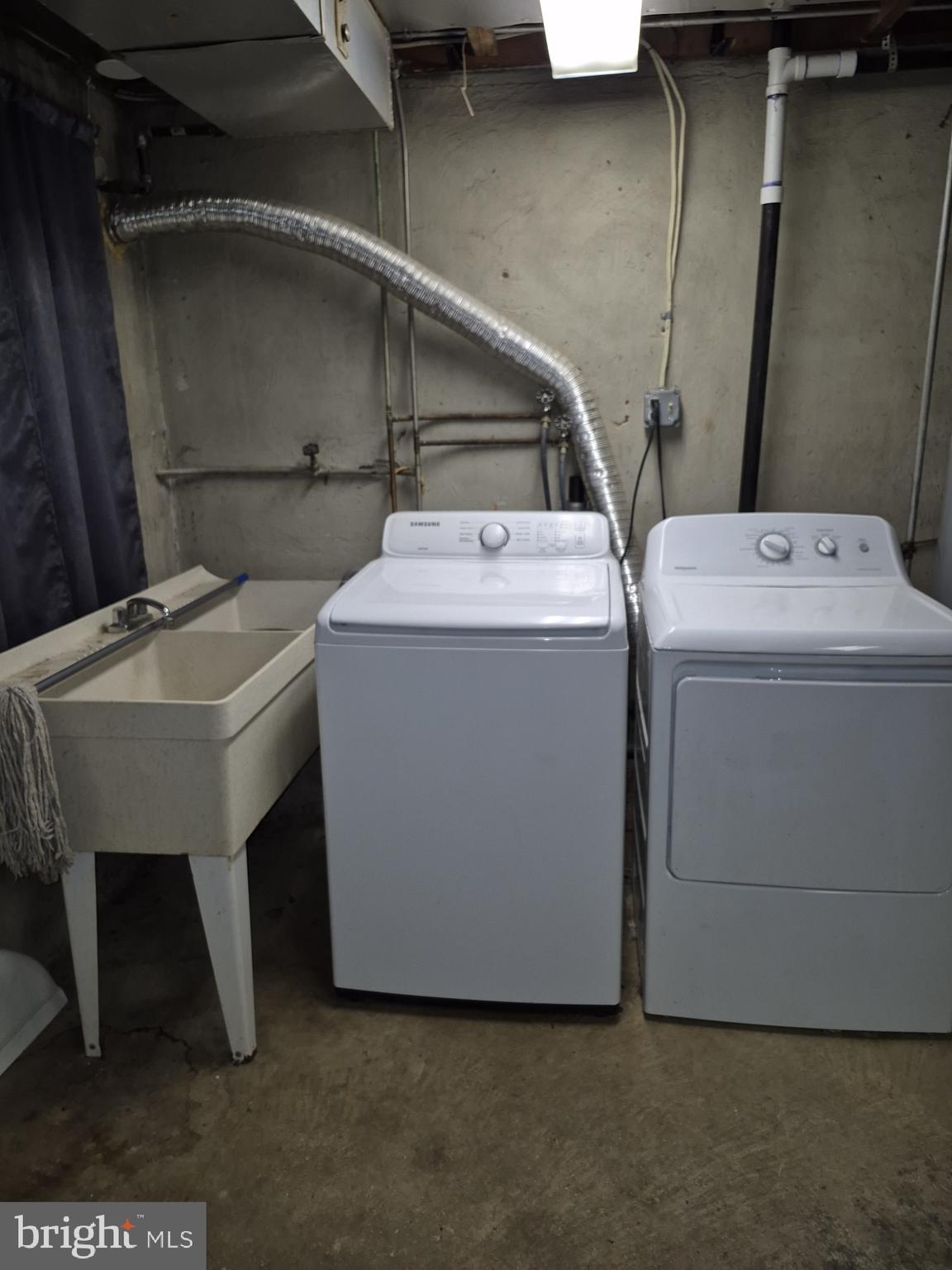 4905 Briarclift Road Baltimore, MD 21229 - Photo 31 of 41 a utility room with dryer and washer