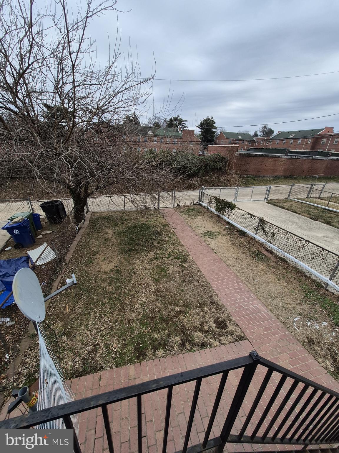 4905 Briarclift Road Baltimore, MD 21229 - Photo 35 of 41 a view of a backyard with wooden fence
