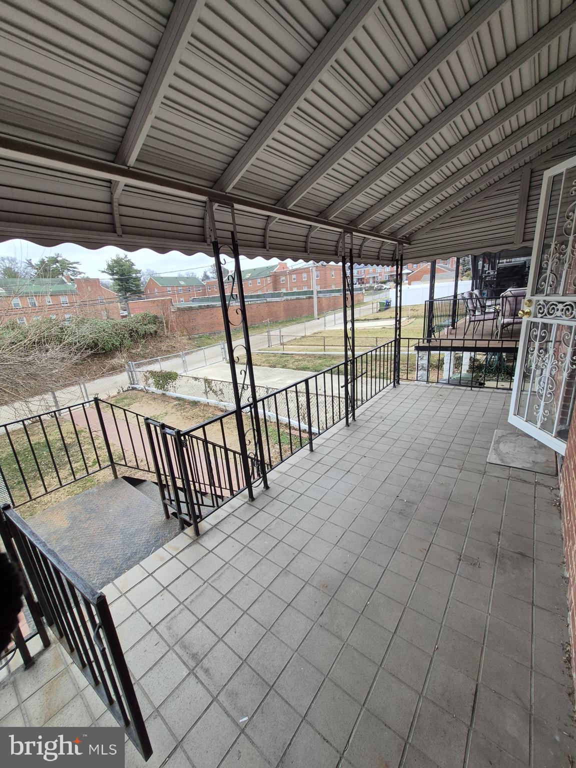 4905 Briarclift Road Baltimore, MD 21229 - Photo 38 of 41 a view of a patio with wooden floor