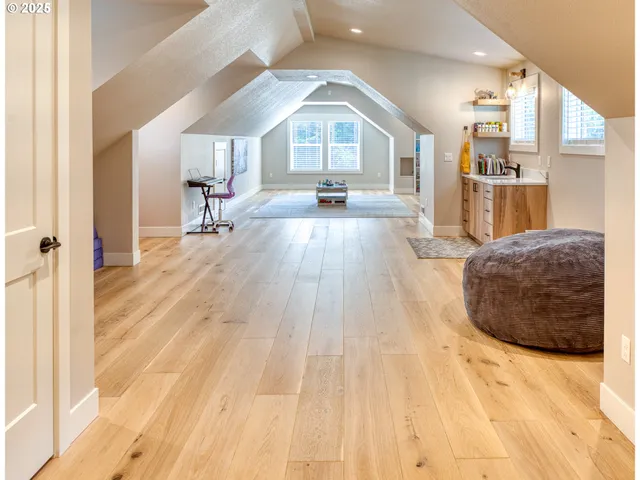 a view of a living room and kitchen
