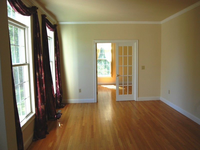 5 Cricklewood Road Redding, CT 06896 - Photo 3 of 16 a view of a room with wooden floor and stairs