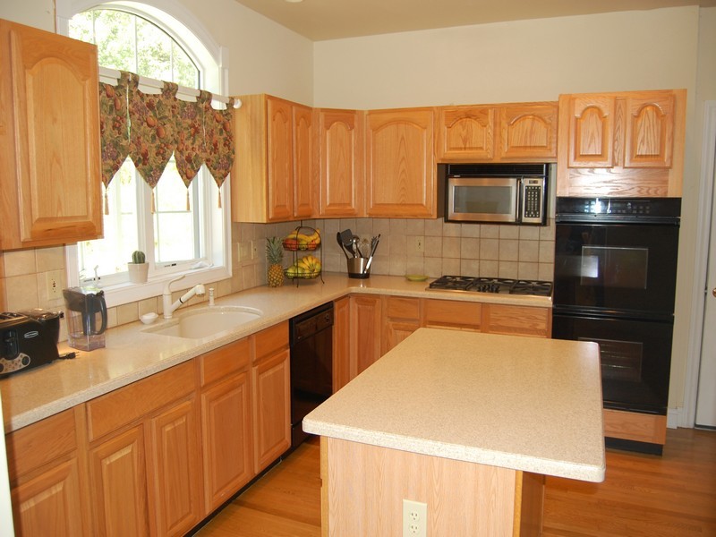 5 Cricklewood Road Redding, CT 06896 - Photo 6 of 16 a kitchen with stainless steel appliances a sink dishwasher stove refrigerator and microwave