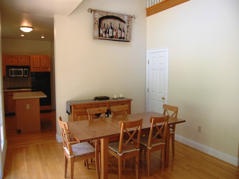 5 Cricklewood Road Redding, CT 06896 - Photo 7 of 16 a view of a dining room with furniture and wooden floor