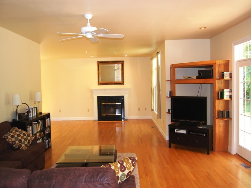 5 Cricklewood Road Redding, CT 06896 - Photo 8 of 16 a living room with furniture and a flat screen tv