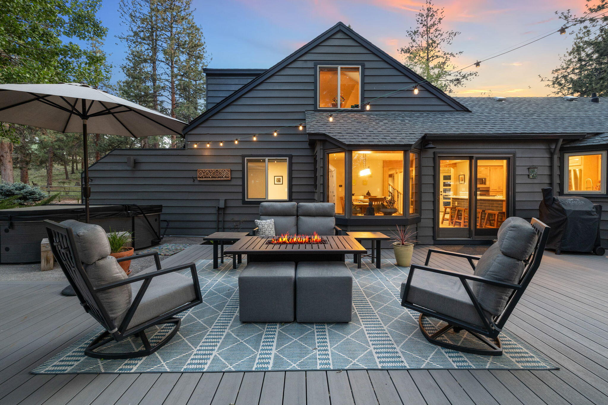 60210 East Ridgeview Drive Bend, OR 97702 - Photo 3 of 55 a outdoor living space with furniture and wooden floor