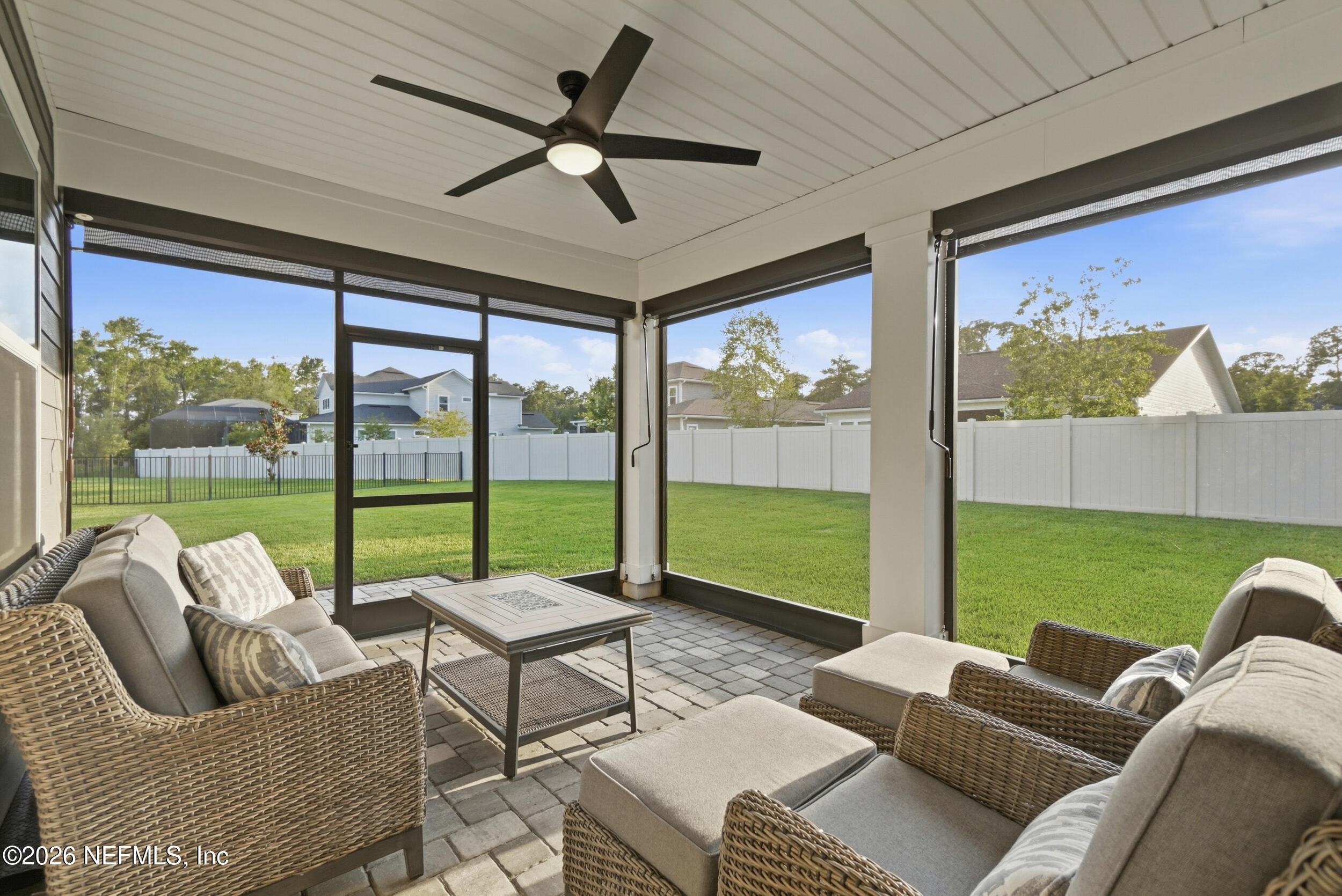 34 Red Rock Lane St. Johns, FL 32259 - Photo 51 of 71 a living room with furniture and a large window
