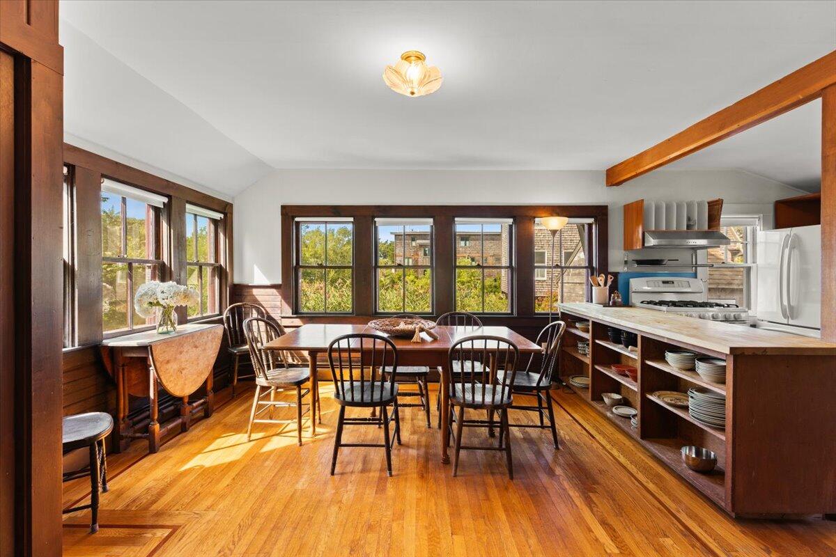 5 Park Road Woods Hole, MA 02543 - Photo 12 of 45 a view of a dining room with furniture window and wooden floor