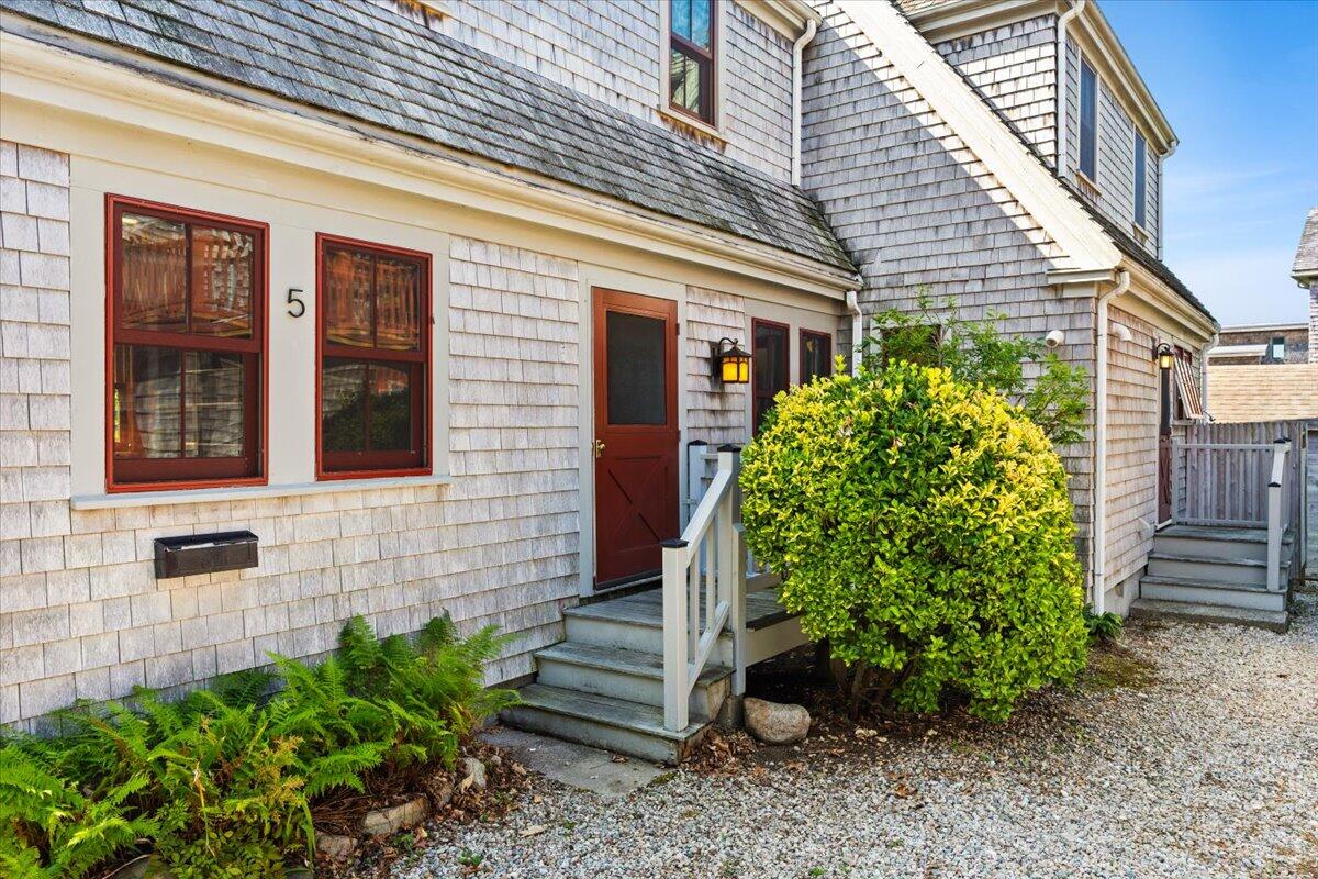 5 Park Road Woods Hole, MA 02543 - Photo 29 of 45 a front view of a house with garden