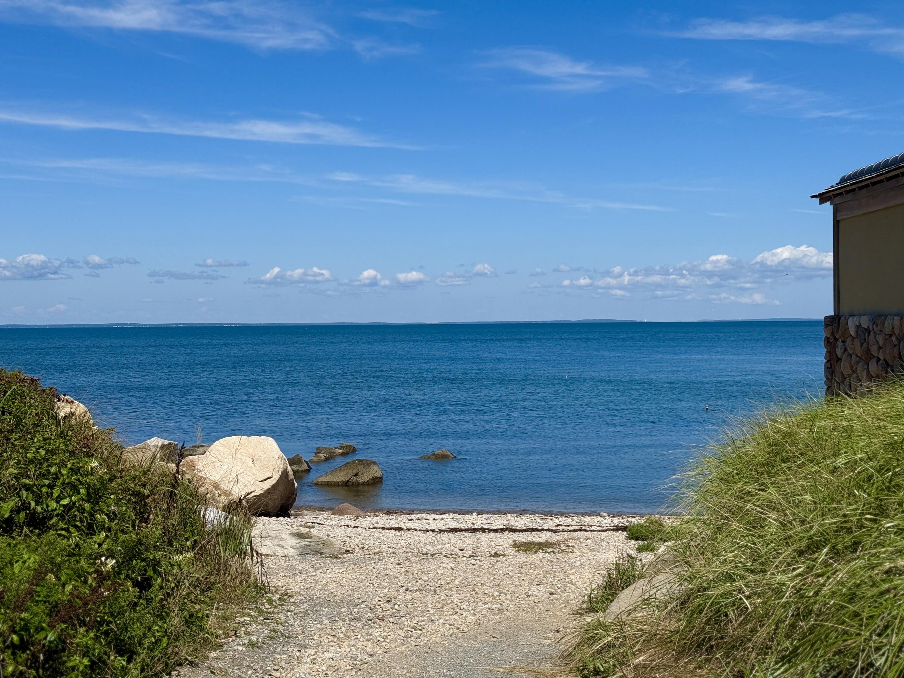 5 Park Road Woods Hole, MA 02543 - Photo 33 of 45 a view of a lake with a mountain in the background
