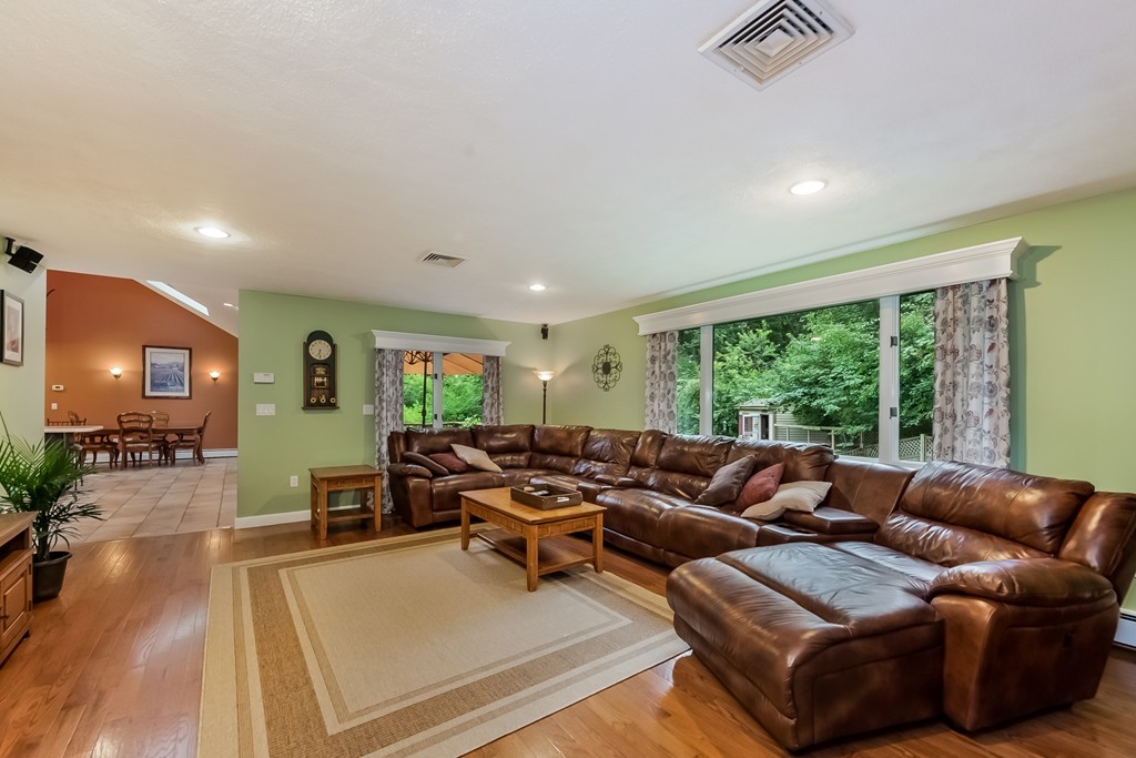 265 Andover Road Billerica, MA 01821 - Photo 5 of 30 a living room with furniture and a large window