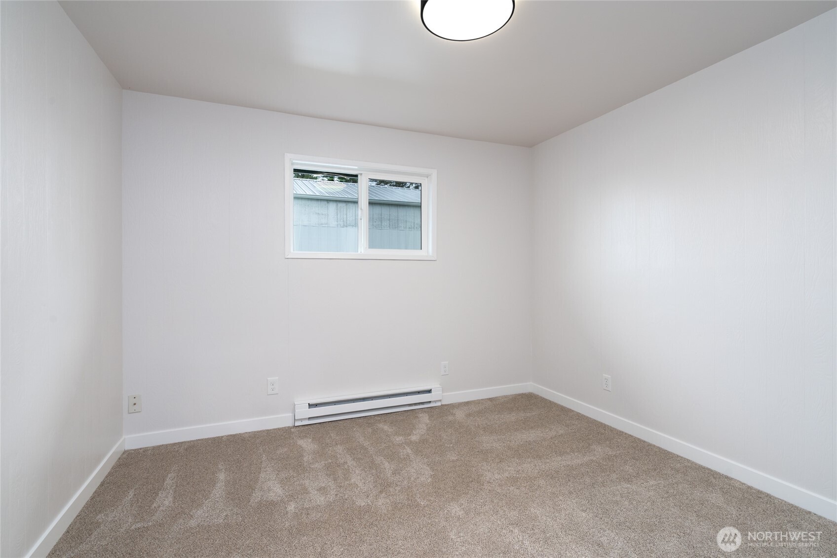 944 Fidalgo Street Sedro-Woolley, WA 98284 - Photo 17 of 28 an empty room with a window