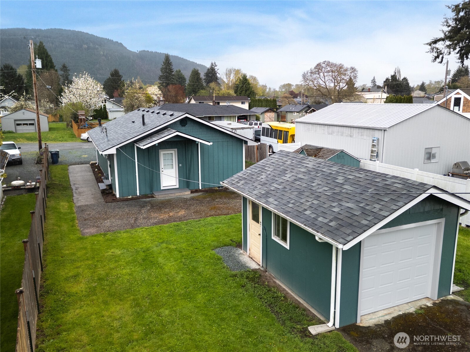 944 Fidalgo Street Sedro-Woolley, WA 98284 - Photo 23 of 28 an aerial view of a house with a yard