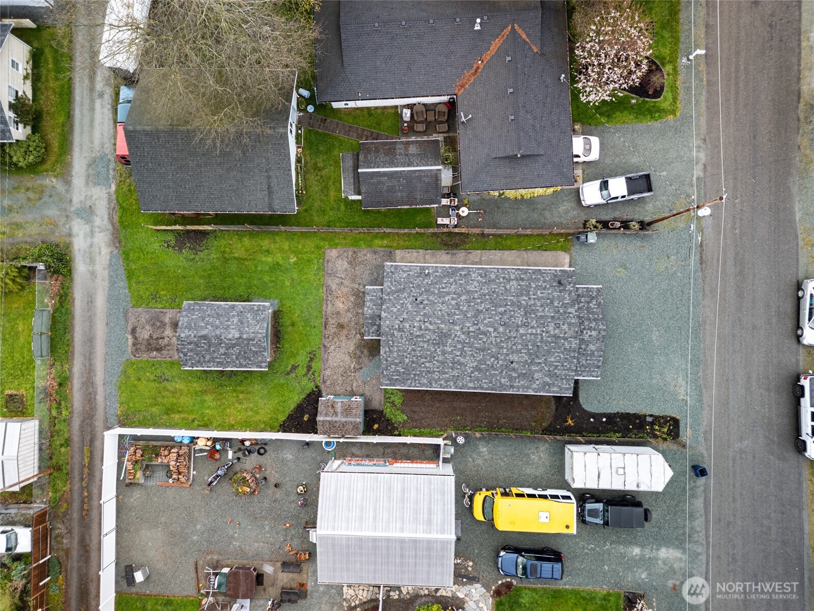 944 Fidalgo Street Sedro-Woolley, WA 98284 - Photo 28 of 28 an aerial view of a house with a yard