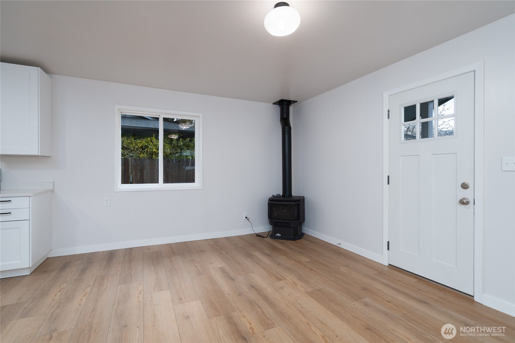 944 Fidalgo Street Sedro-Woolley, WA 98284 - Photo 5 of 28 a view of an empty room with a window