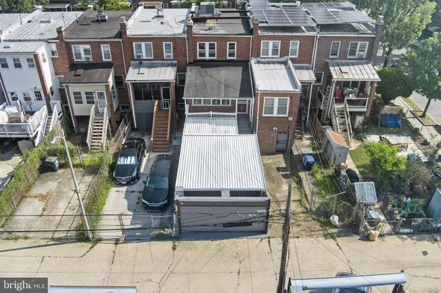 a view of a building with a tree