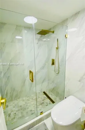 a bathroom with a sink and a shower