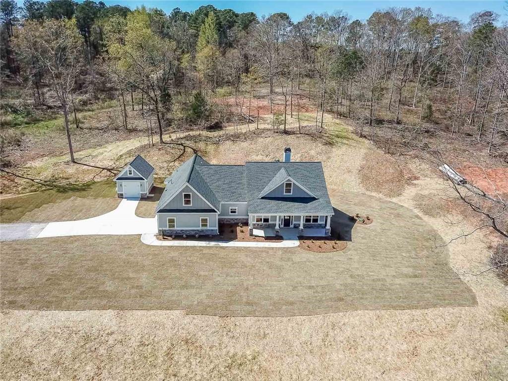 886 Forrester Cemetery Road Covington, GA 30014 - Photo 1 of 1 a view of a house with a yard