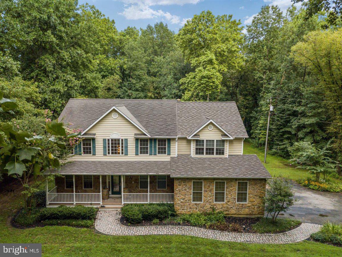 3965 Patuxent River Road Davidsonville, MD 21035 - Photo 1 of 66 Welcoming porch with stone accents