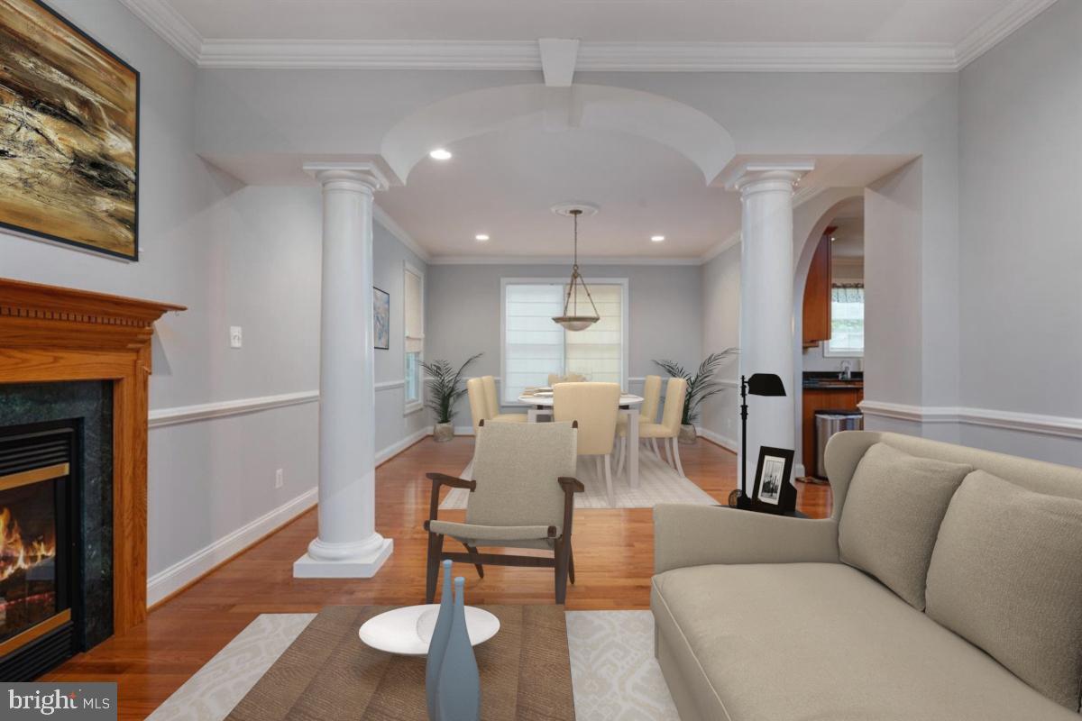 3965 Patuxent River Road Davidsonville, MD 21035 - Photo 13 of 66 Living room and dining room flanked with columns
