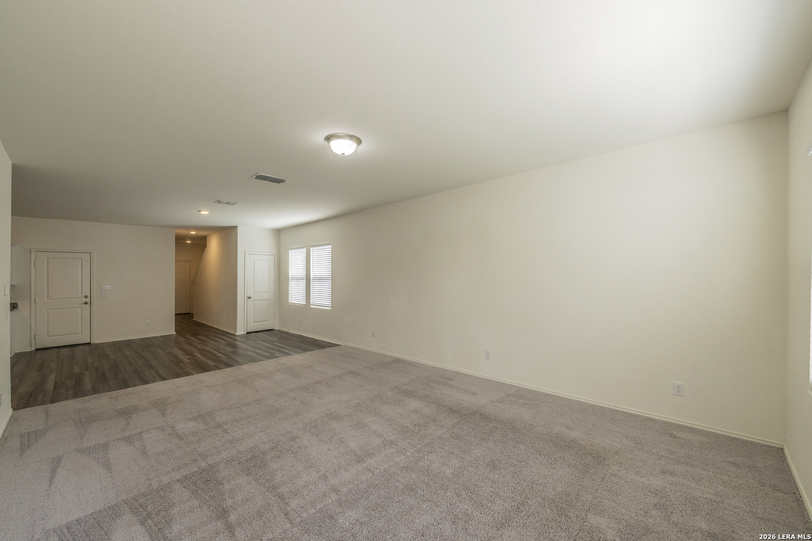 5203 Winding Streme St. Hedwig, TX 78152 - Photo 6 of 26 a view of an empty room and window