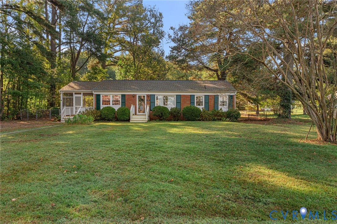 310 East Gwynnfield Road Tappahannock, VA 22560 - Photo 2 of 27 Nice size front yard with peek of River.