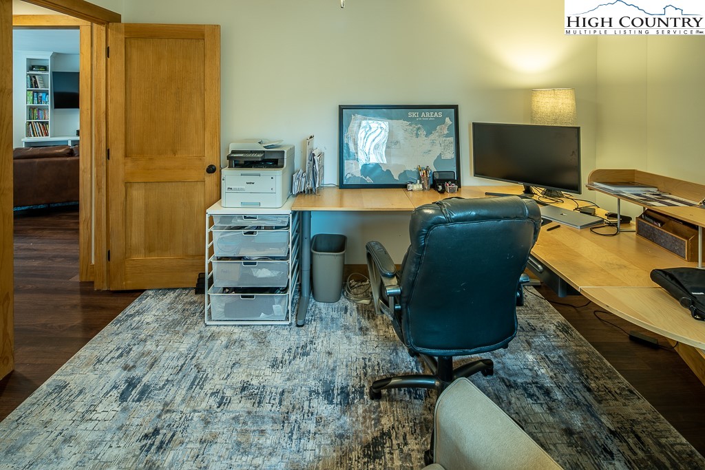 102 Ski Beech Road Beech Mountain, NC 28604 - Photo 27 of 40 a room with cabinets and a wooden floor