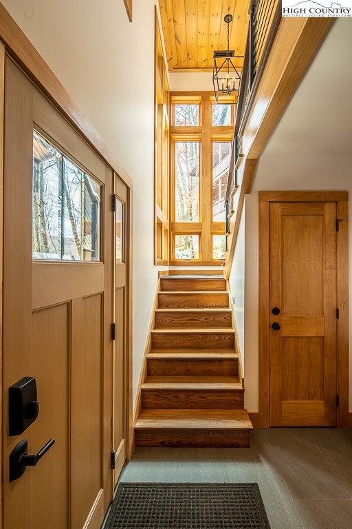 102 Ski Beech Road Beech Mountain, NC 28604 - Photo 9 of 40 a view of entryway with wooden floor and windows