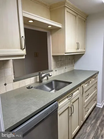 a kitchen with a stove and a microwave
