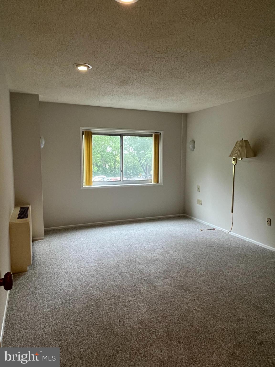 100 West Avenue, Unit 118S Jenkintown, PA 19046 - Photo 20 of 36 a view of an empty room with a window