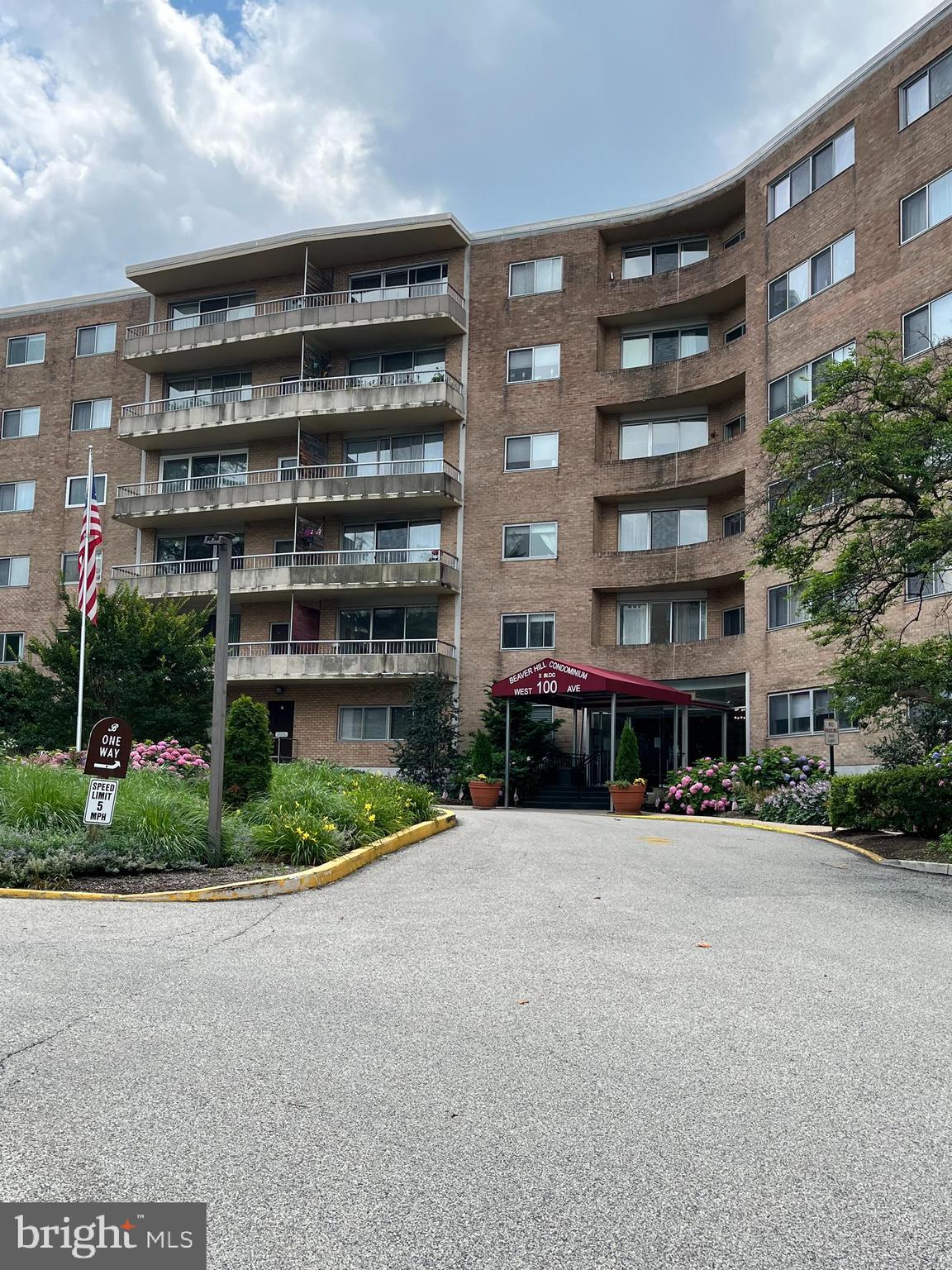100 West Avenue, Unit 118S Jenkintown, PA 19046 - Photo 2 of 36 a front view of a building with a garden