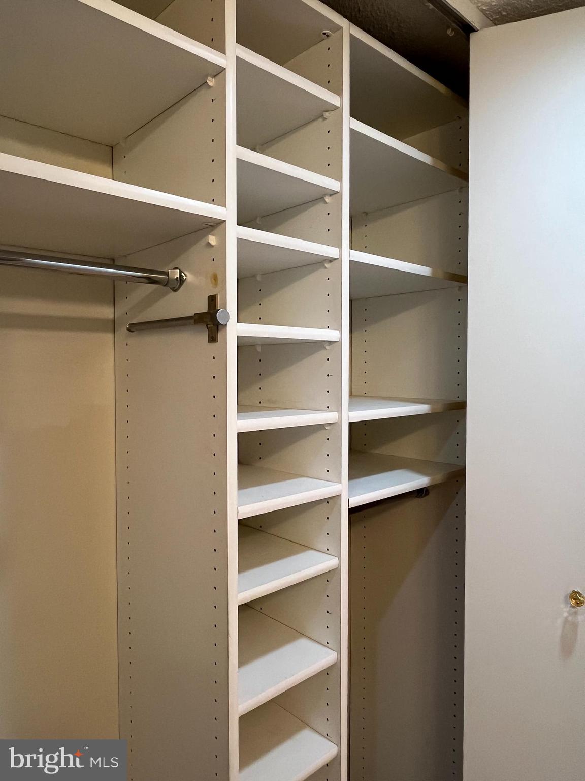 100 West Avenue, Unit 118S Jenkintown, PA 19046 - Photo 22 of 36 a view of walk in closet with empty racks