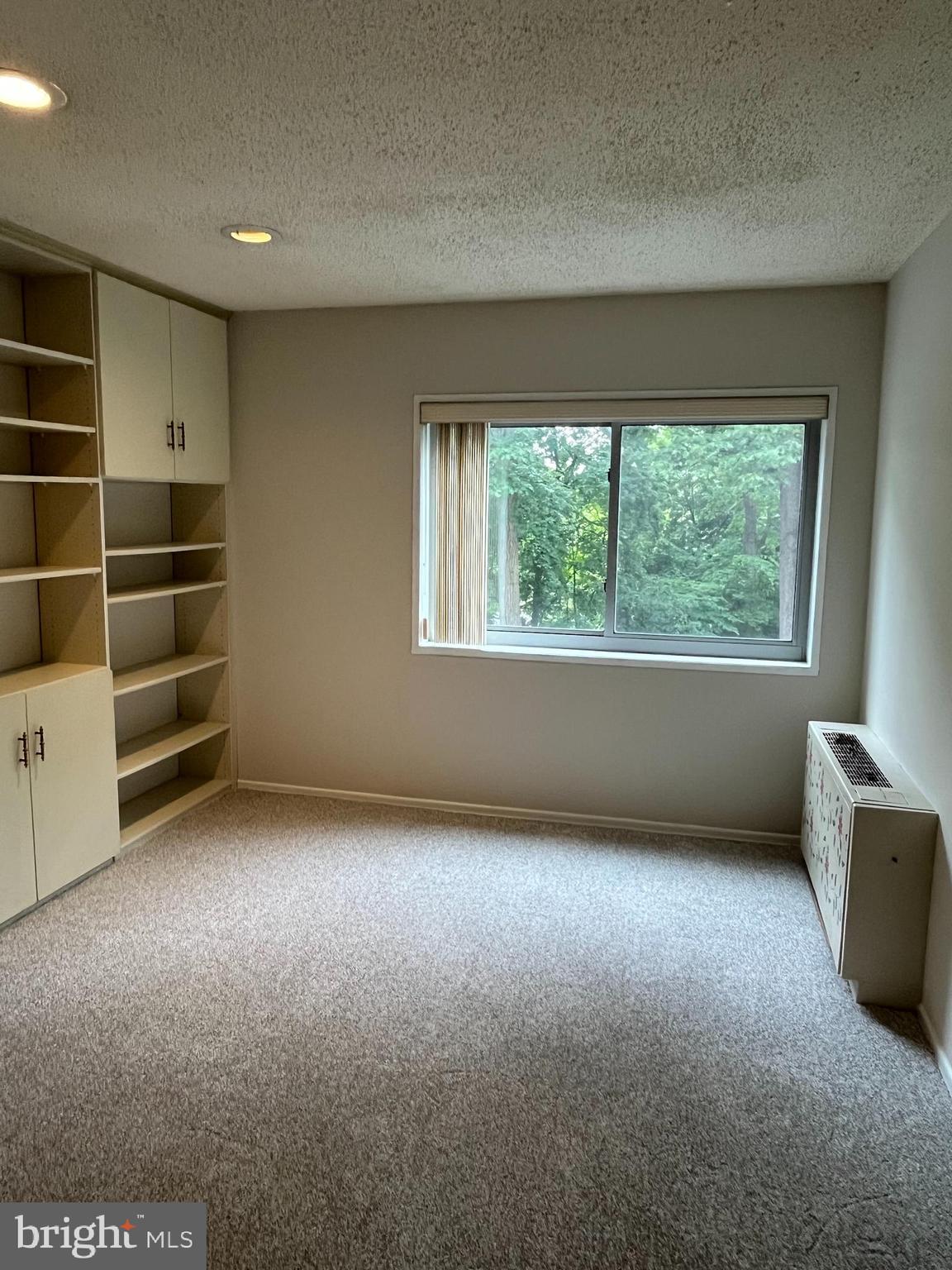 100 West Avenue, Unit 118S Jenkintown, PA 19046 - Photo 24 of 36 a view of an empty room with a window