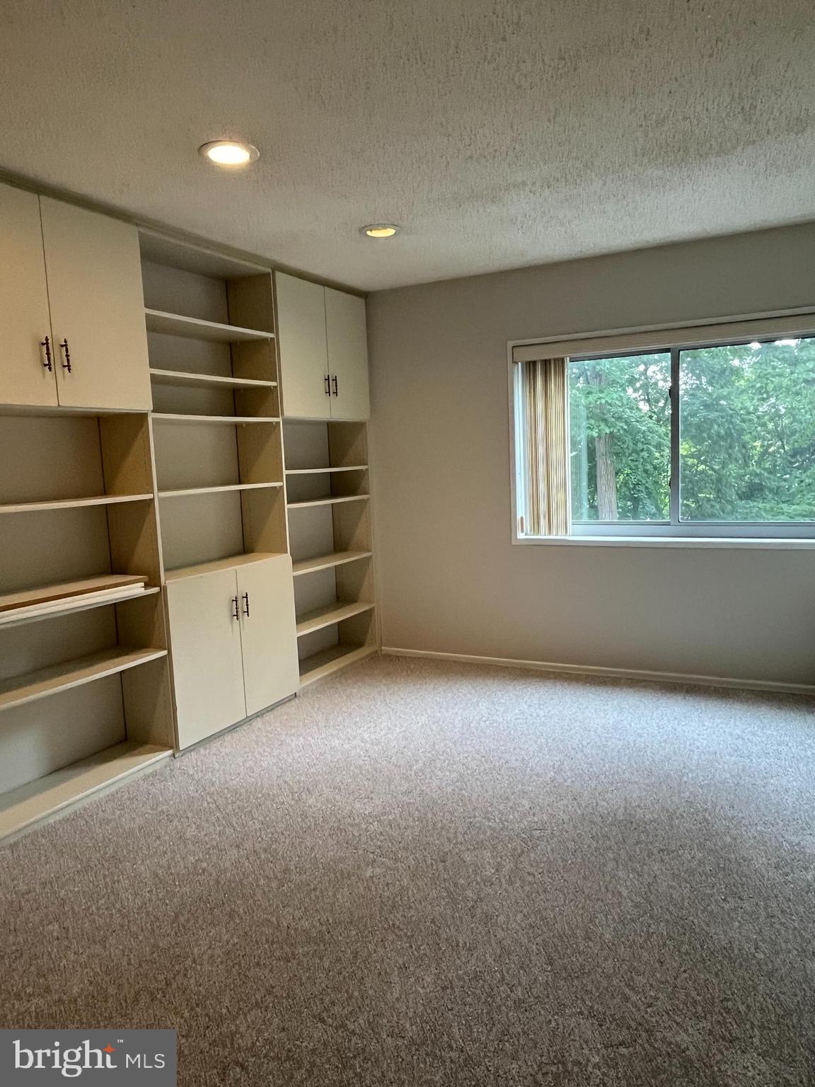 100 West Avenue, Unit 118S Jenkintown, PA 19046 - Photo 25 of 36 a view of an empty room with a window