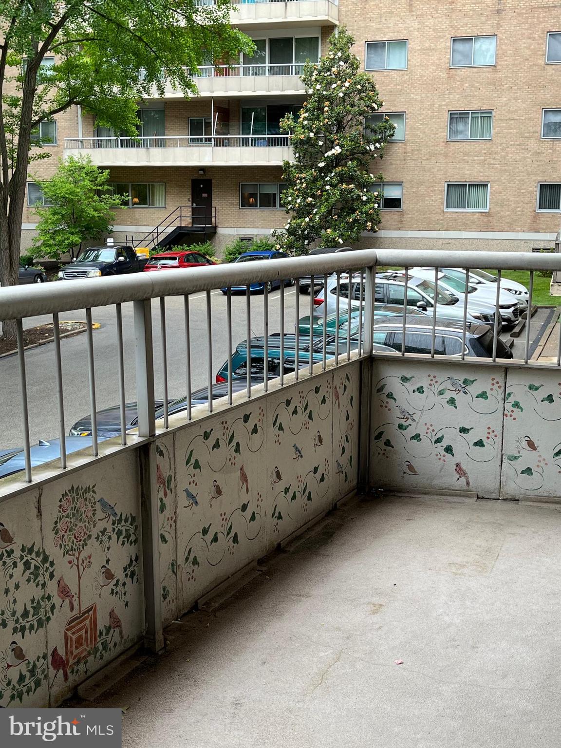 100 West Avenue, Unit 118S Jenkintown, PA 19046 - Photo 31 of 36 a view of a wooden house with a wooden fence