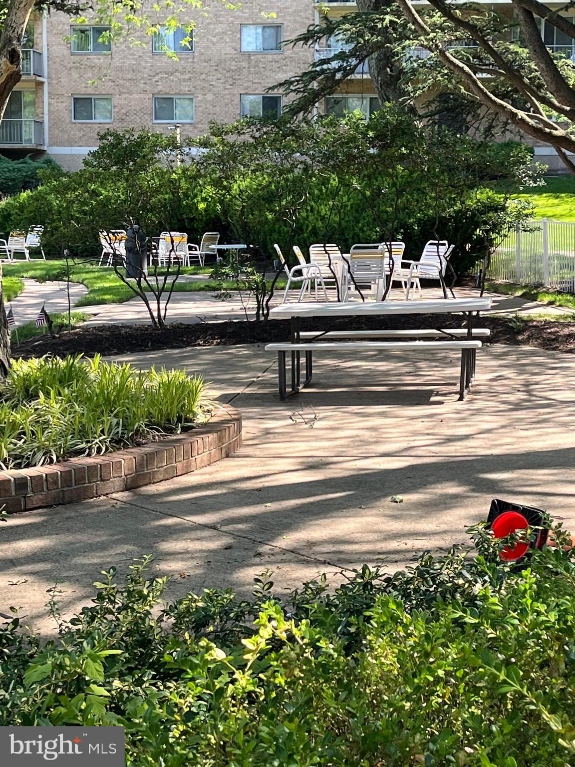 100 West Avenue, Unit 118S Jenkintown, PA 19046 - Photo 35 of 36 a view of yard and sign board