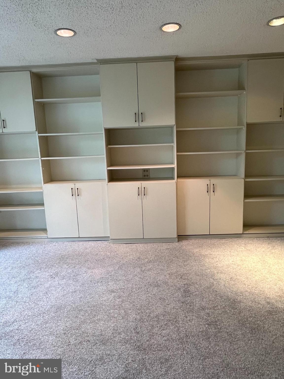 100 West Avenue, Unit 118S Jenkintown, PA 19046 - Photo 5 of 36 a view of an empty room with empty shelves