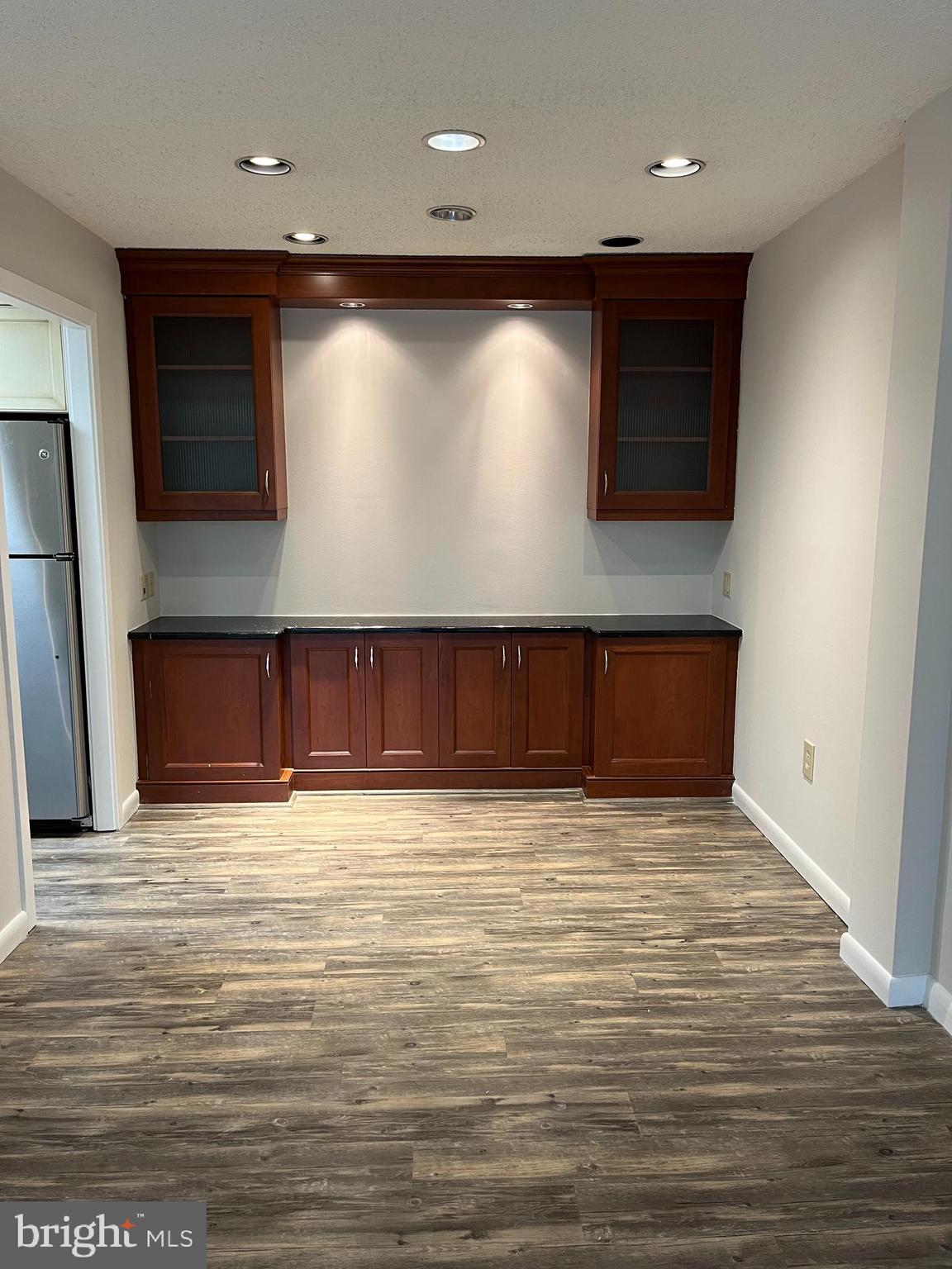 100 West Avenue, Unit 118S Jenkintown, PA 19046 - Photo 10 of 36 a view of an empty room with wooden floor