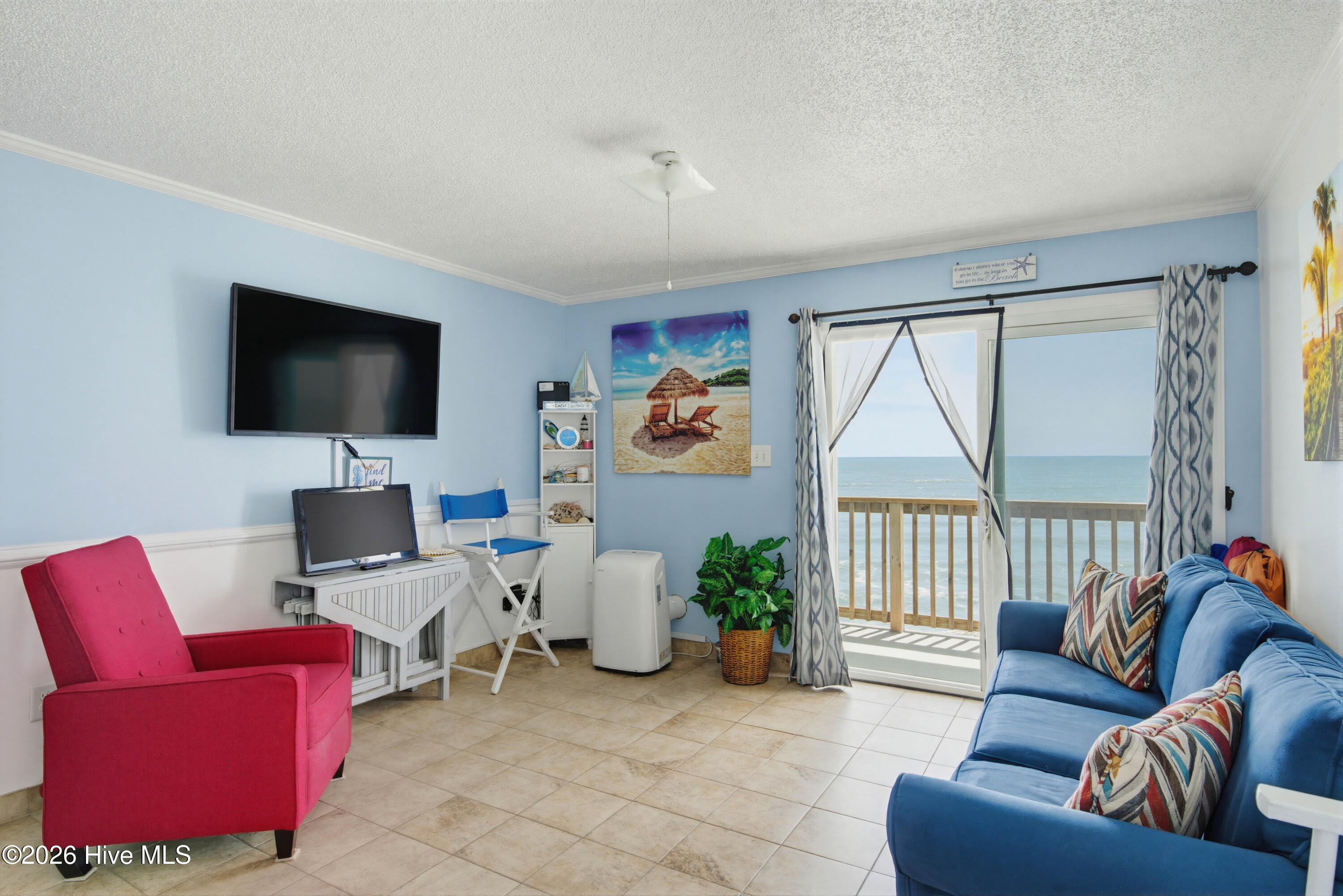 2264 New River Inlet Road, Unit 309 North Topsail Beach, NC 28460 - Photo 13 of 24 309 Topsail Reef - Living Room - Edited