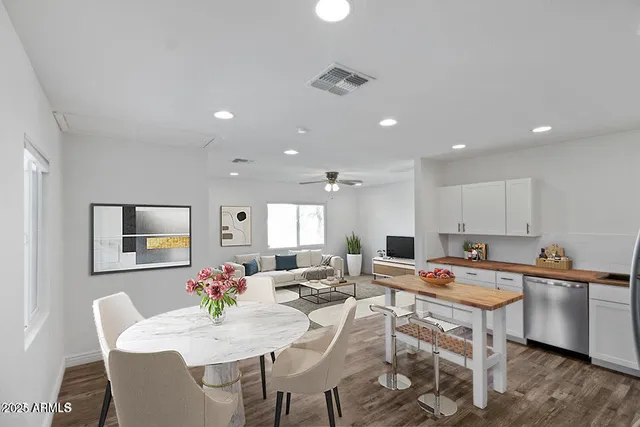 a view of a dining room with furniture