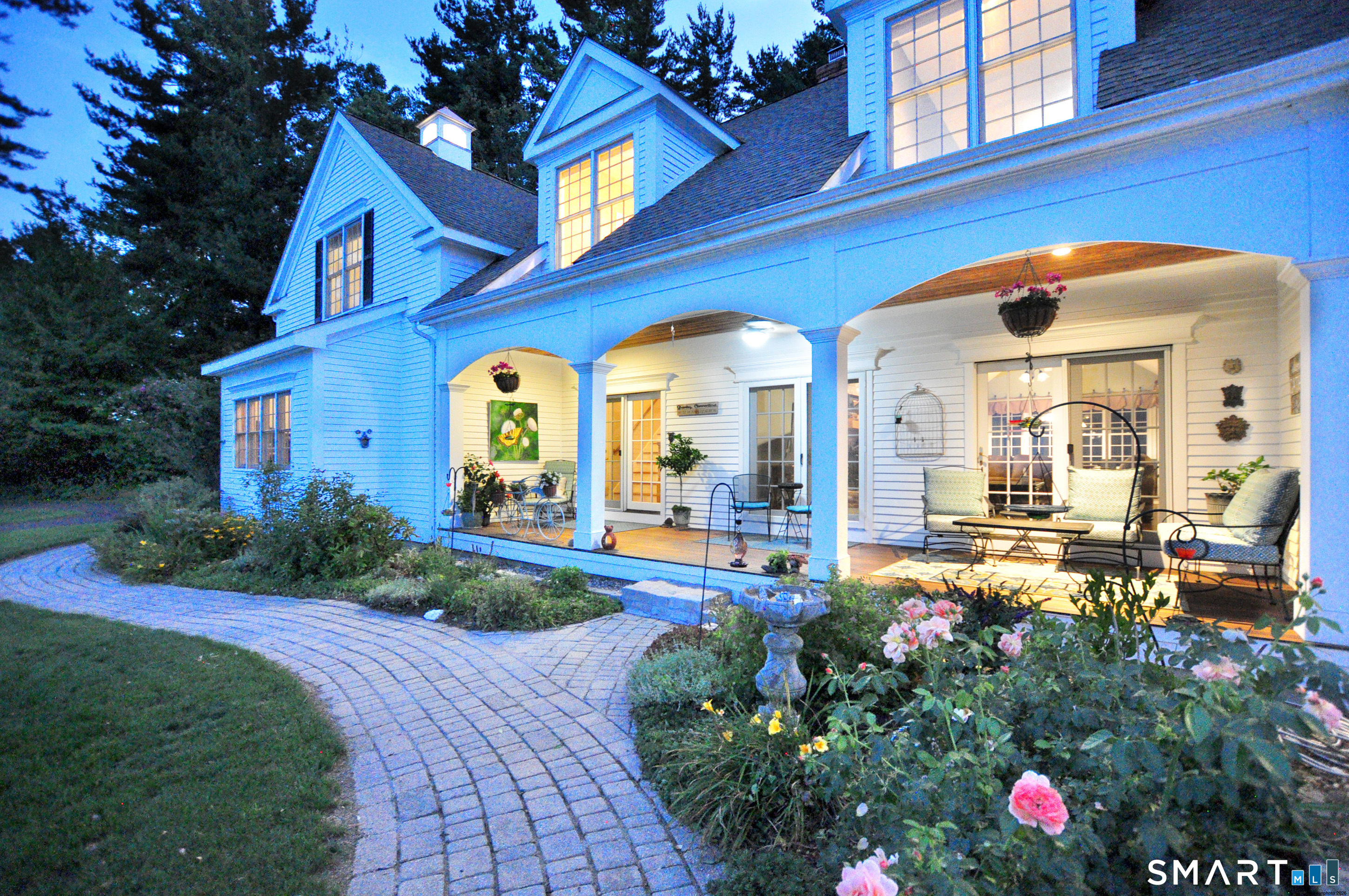 15 Old Orchard Road Granby, CT 06090 - Photo 2 of 40 The mahogany porch serves as an outdoor living space.