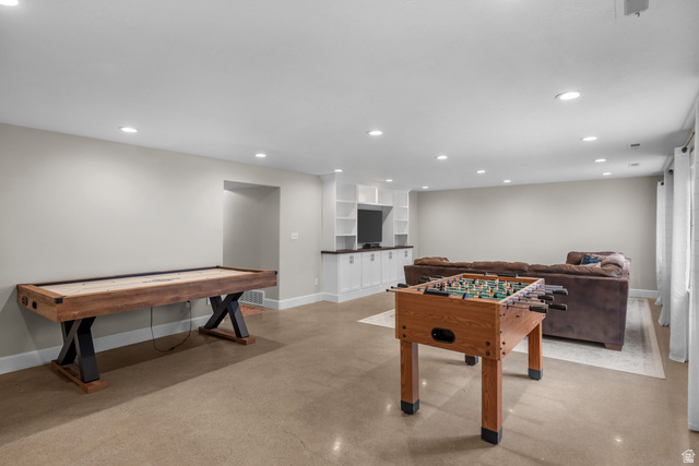1896 West 800 North Mapleton, UT 84663 - Photo 30 of 55 Recreation room featuring concrete flooring and recessed lighting