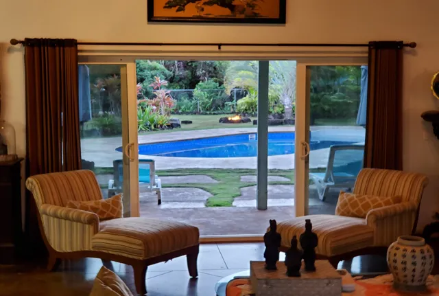 a living room with furniture and a window