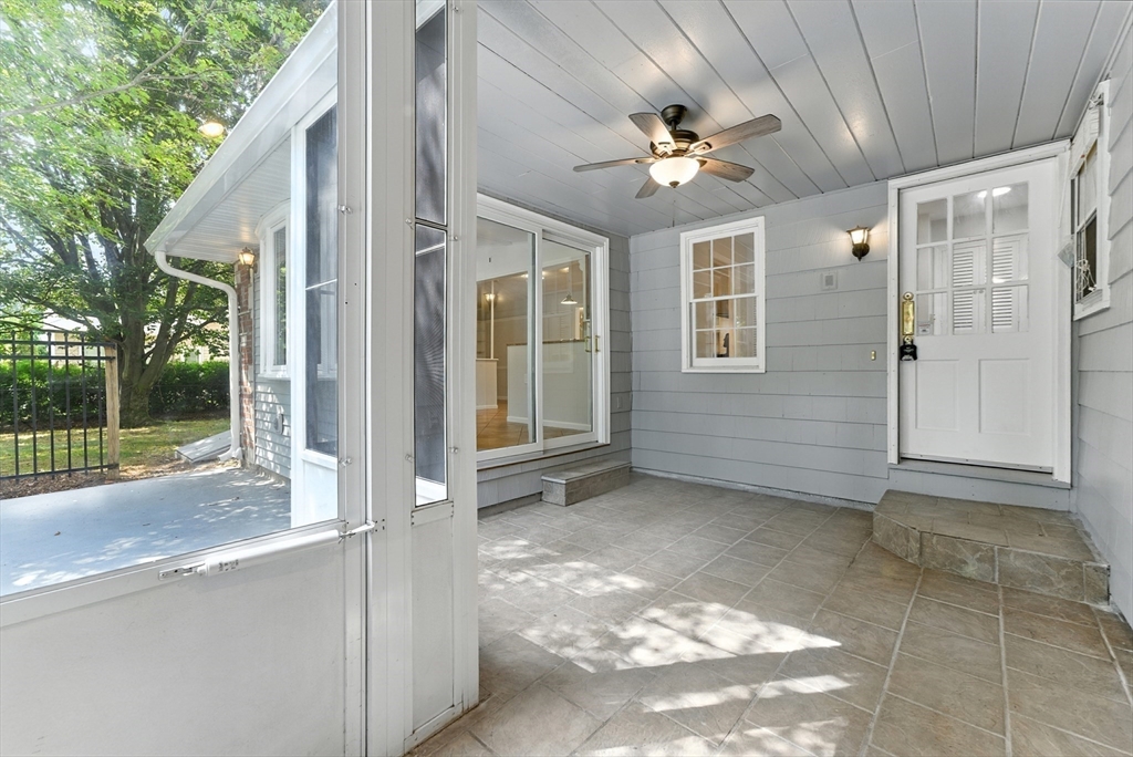 925 Williams Street Longmeadow, MA 01106 - Photo 18 of 38 a view of a hallway with a chandelier