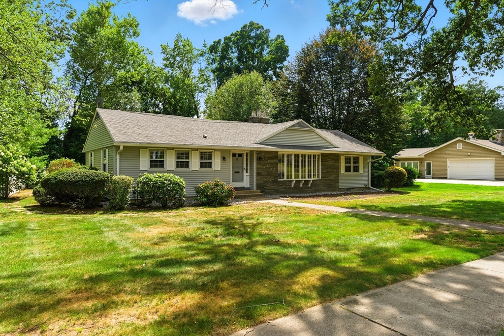 925 Williams Street Longmeadow, MA 01106 - Photo 2 of 38 a front view of house with yard and green space